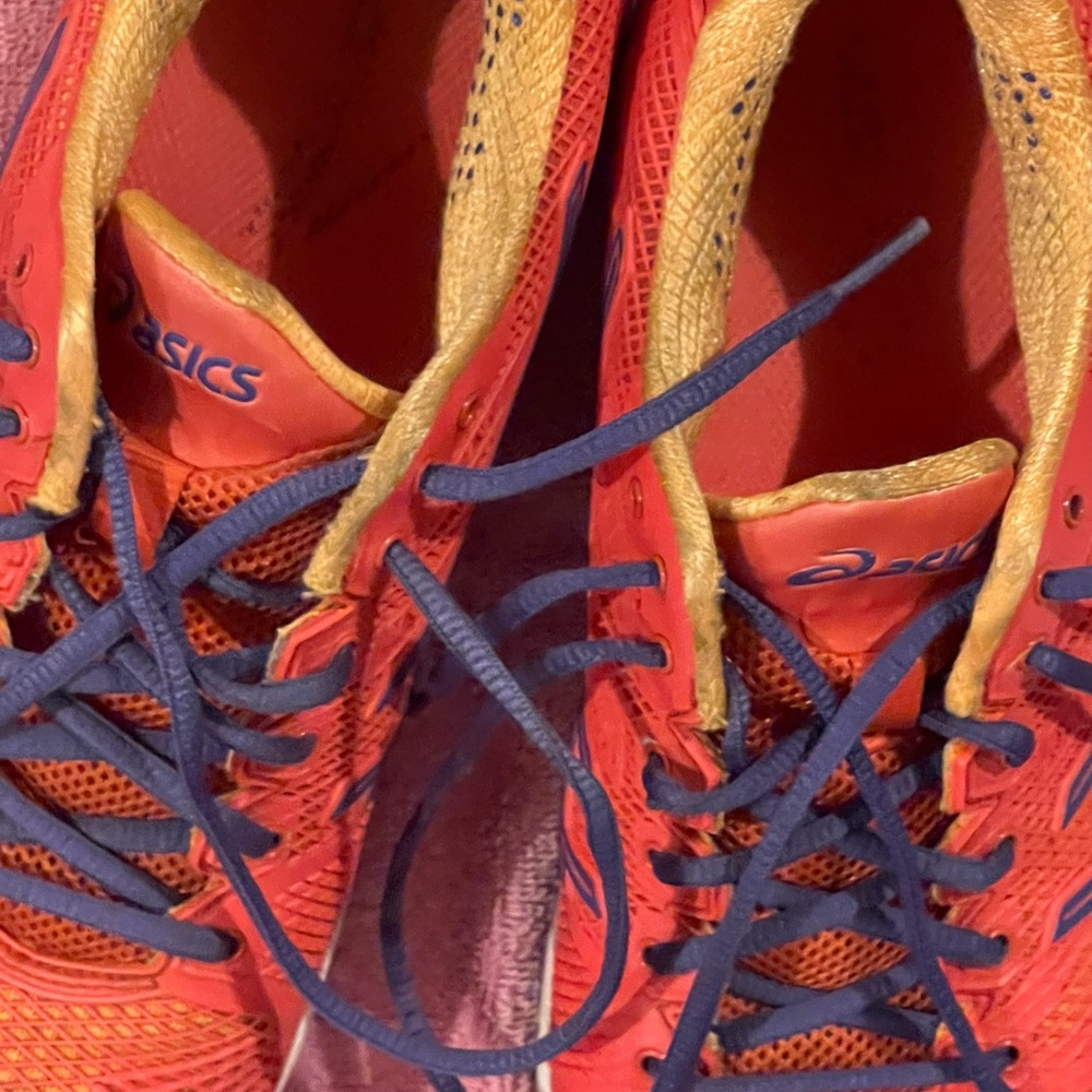 Red yellow and blue ASICS